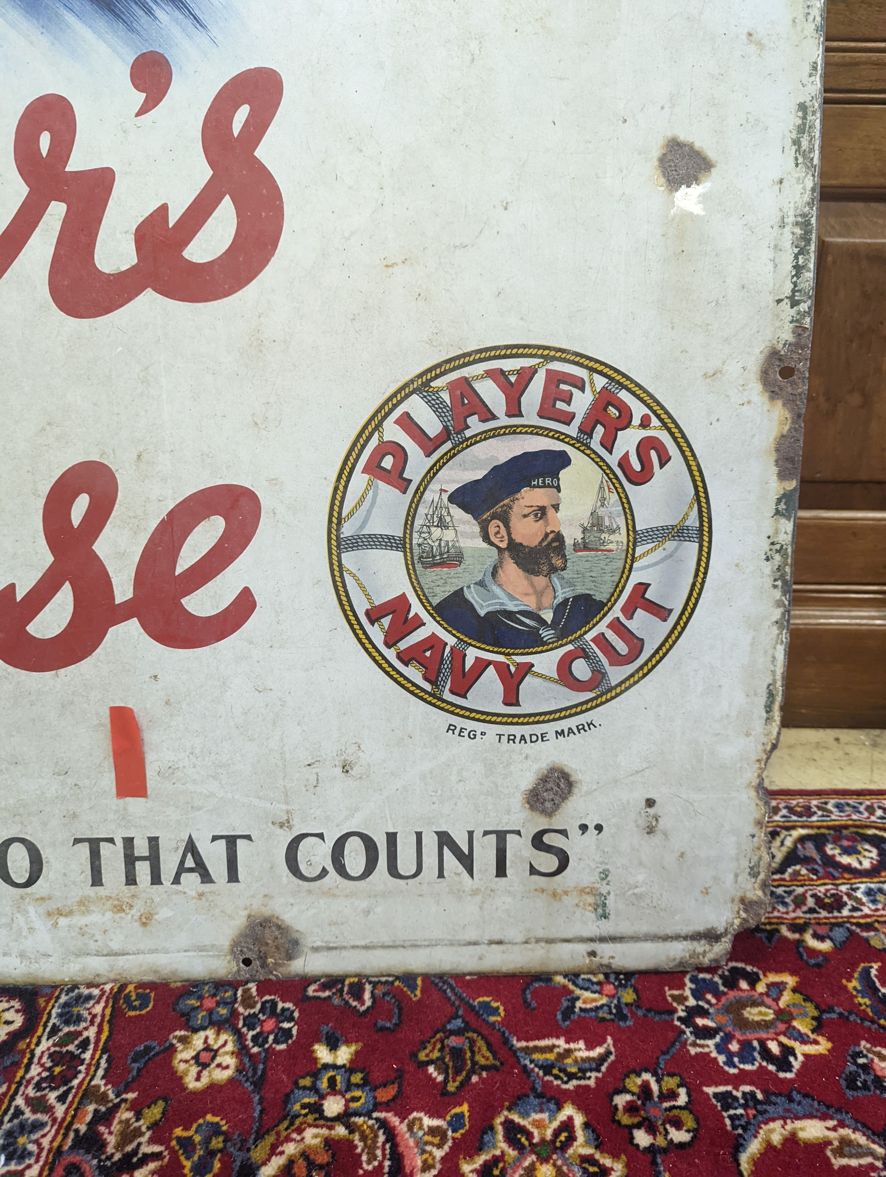 A large enamel advertising sign, 'Player's Please', length 97cm, height 148cm